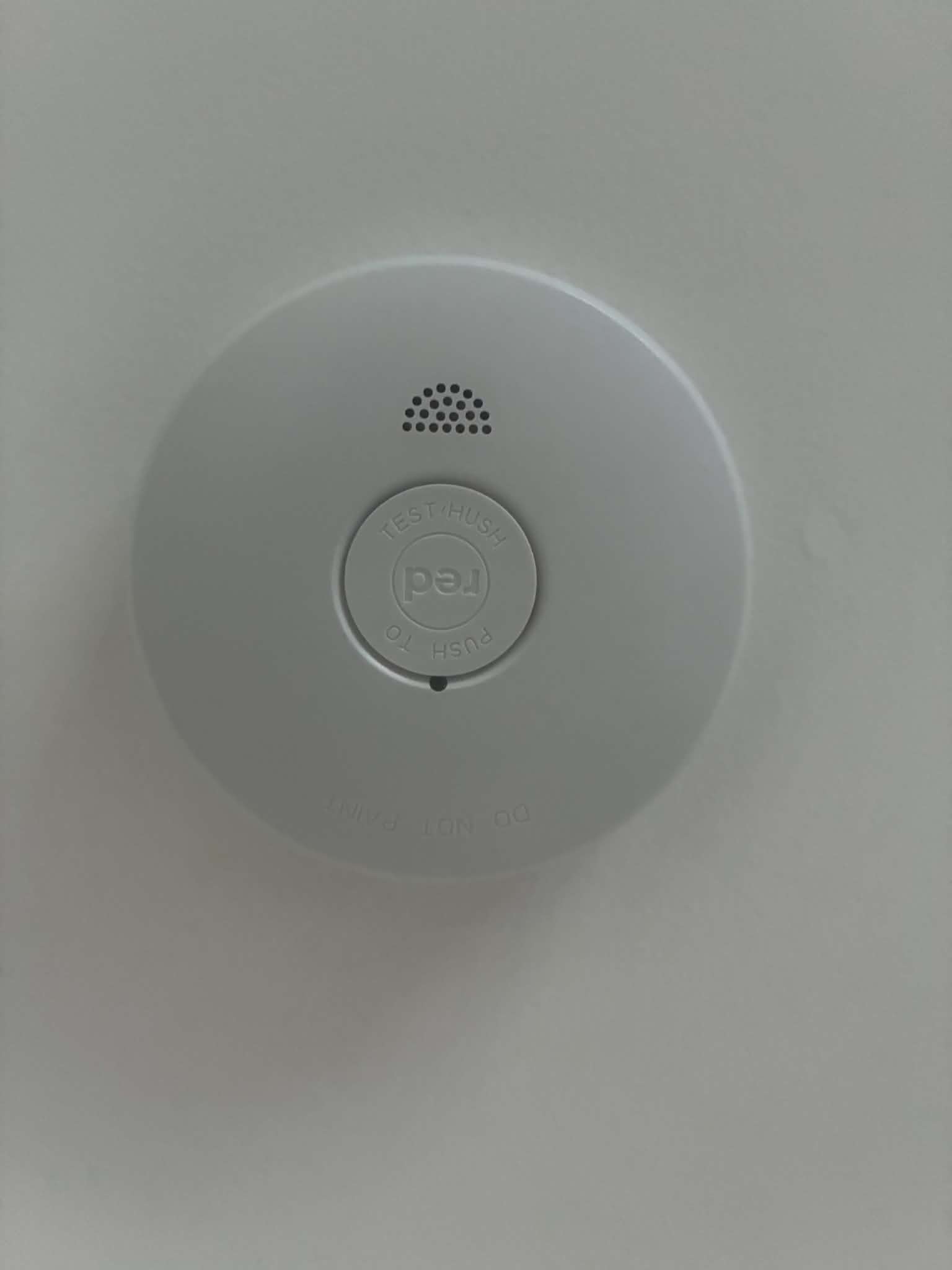 Interconnected smoke alarm fitted in a Sunshine Coast home